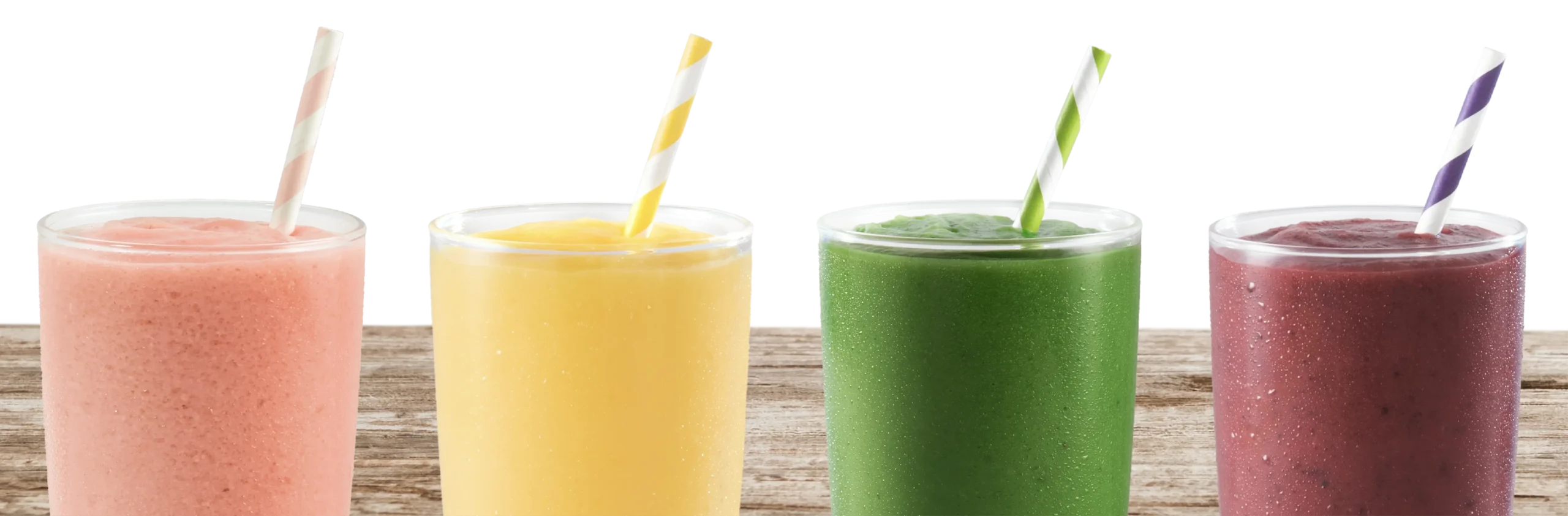 4 varieties of Tropical smoothie cafe smoothies in glasses with straw