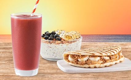 “Tropical Smoothie Cafe Acai bowl in a bowl and Sunrise Sunset smoothie in a glass with Tropical Smoothie Cafe logo. A background with text ' freshly made sips & bites, anyone?”