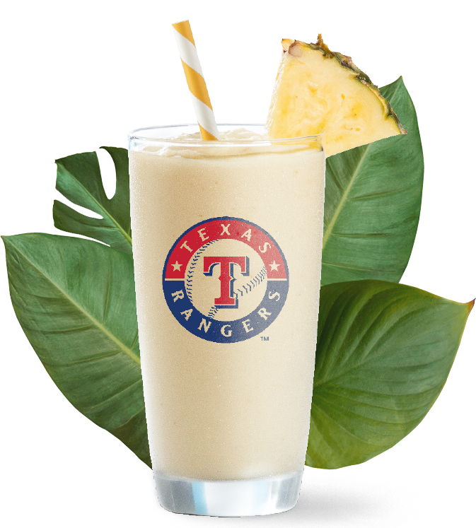 Texas Rangers official smoothie in a glass, a piece of pineapple with 4 green leaves. Title - Rangers Tropi-Colada smoothie. Banana, Pineapple and Coconut smoothie. 320 cal.